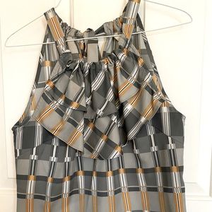 Sleeveless Banana Republic blouse with ruffle & tie